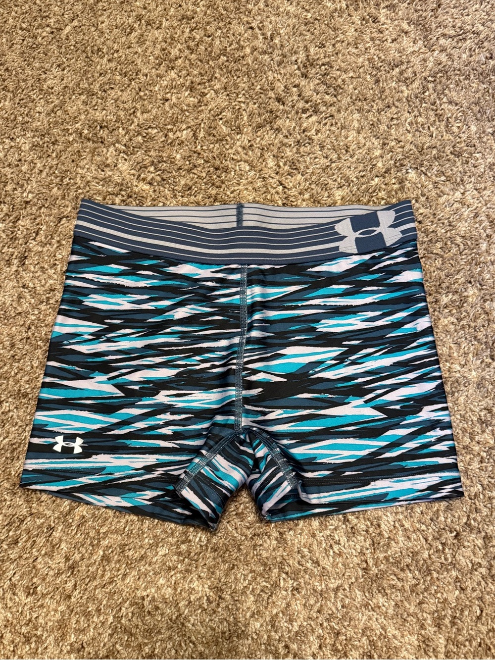 Under Armour patterned compression shorts - probably size girls xl or women’s s
